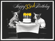 Happy Birthday Age 33 GIF, 33rd Birthday GIF: Vintage animated birthday card gif with name, flickering candles, birthday cake, and 2 dogs sitting at the table.