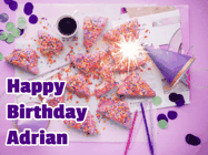 Happy Birthday Adrian GIF: A big paper sparkle highlights this animated birthday gif showing a birthday cake place setting with decorations.